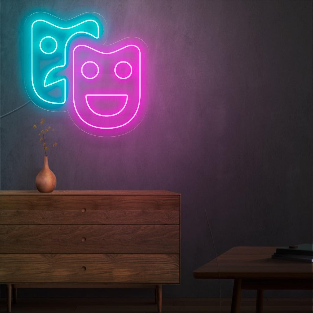 Ein faszinierendes Neonschild mit Theatermasken, das Drama und darstellende Künste symbolisiert. Dieses Schild verleiht jedem Veranstaltungsort einen Hauch von Eleganz und Reiz