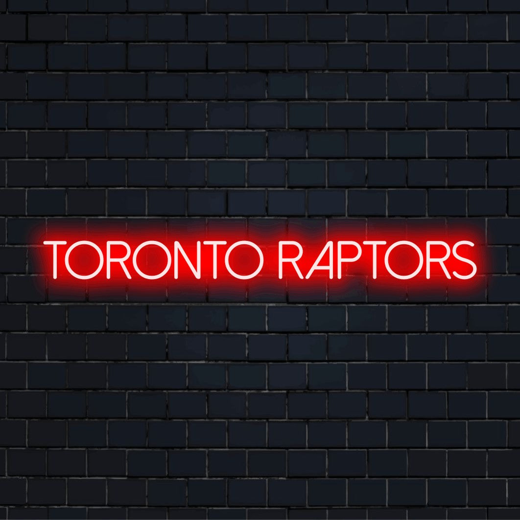 Toronto Raptors Neon Light with glowing neon text against black brick wall