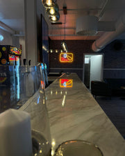 Neon signs inside a gaming and arcade venue