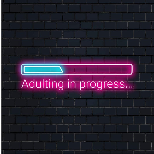  Adulting In Progress... Custom LED neon sign featuring sleek font, perfect for vibrant neon light decor and artistic expression.
