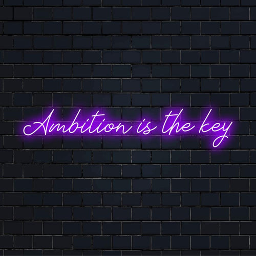 Maßgefertigtes LED-Neonschild mit der Aufschrift „Ambition Is The Key“ in leuchtenden Farben, perfekt für eine individuelle Einrichtung.