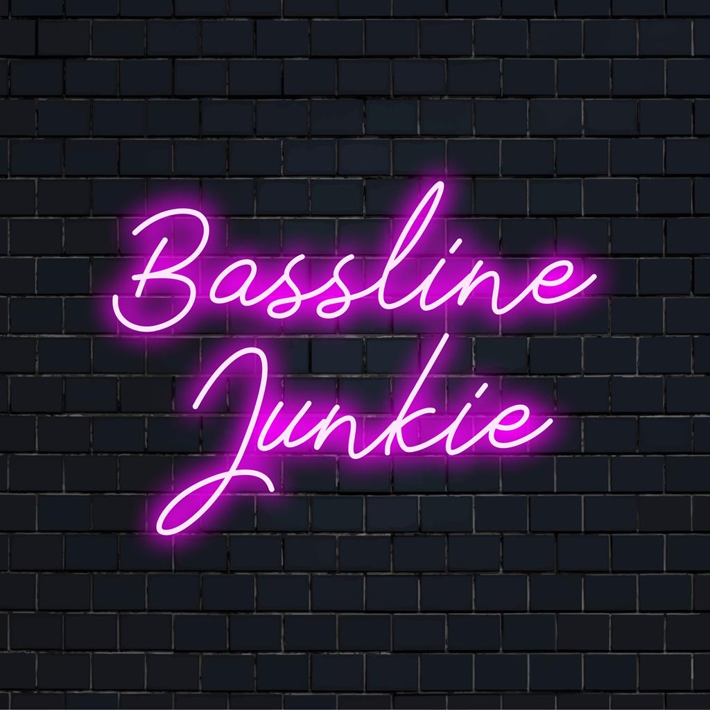 LED neon sign with dynamic 'Bassline Junkie' typography, crafted for energetic spaces. Custom LED decor for music lovers.