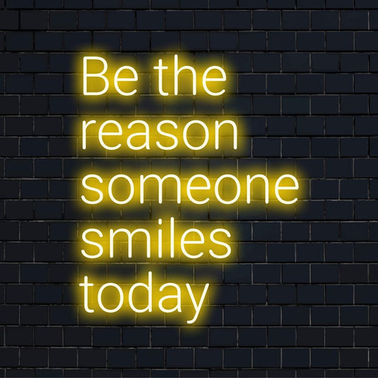 Handmade LED neon sign with Be The Reason Someone Smiles Today uplifting quote; custom neon light decor.