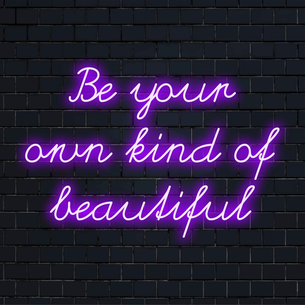 Custom LED neon sign displaying Be Your Own Kind of Beautiful, perfect for inspiring wall decor and personalized message art.