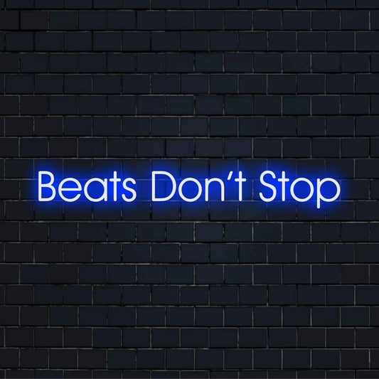 Custom LED neon sign with the phrase Beats Don't Stop, showcasing vibrant neon art for decor and ambiance.