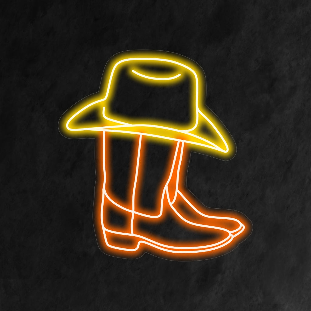 "Cowboy Boots And Western Hat Neon Sign" is a fashionable addition to western decor, featuring a stylish illustration of cowboy boots with a western hat on top. Illuminate your space with the rustic charm and country-style lighting of this unique neon light, making a bold fashion statement.