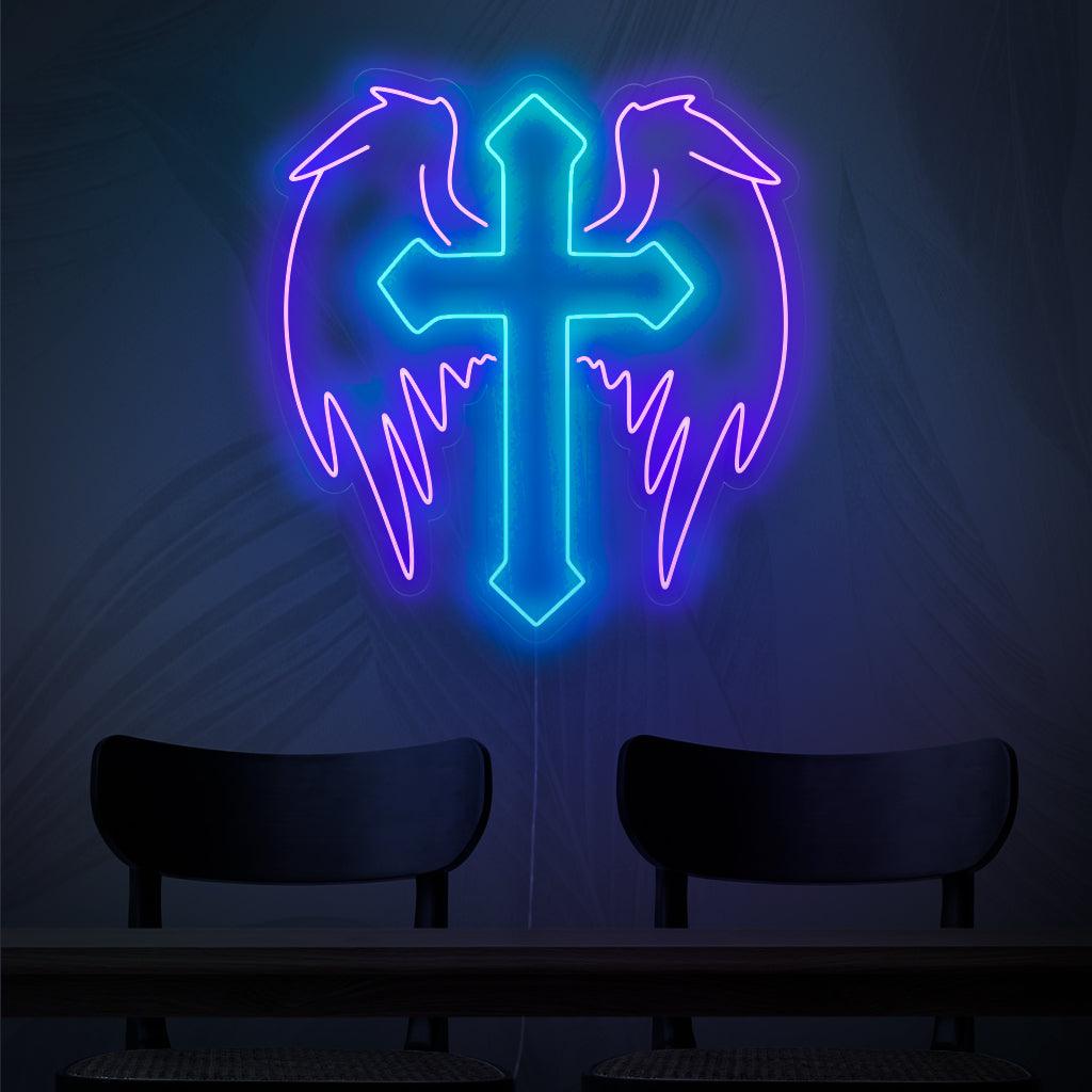 „Neonschild Kreuz mit Engelsflügeln“ – Ein engelhaftes und spirituelles Neonlicht, das ein mit Engelsflügeln geschmücktes Kreuz zeigt und Ihren Raum mit Gelassenheit und himmlischem Charme erfüllt.