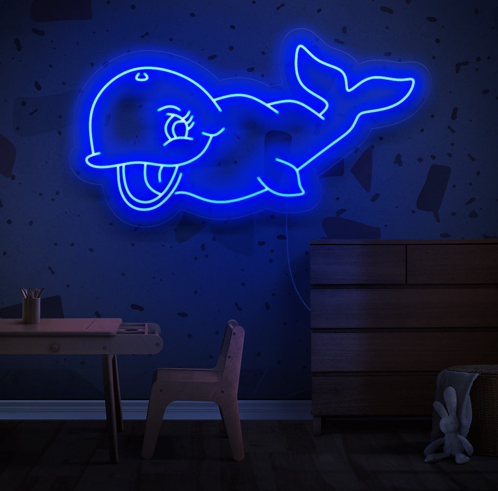 "Cute Whale Smile Neon Sign" lights up with a neon glow, infusing your space with cheerfulness and adorable vibes, perfect for creating a playful and delightful ambiance in bedrooms or play areas.