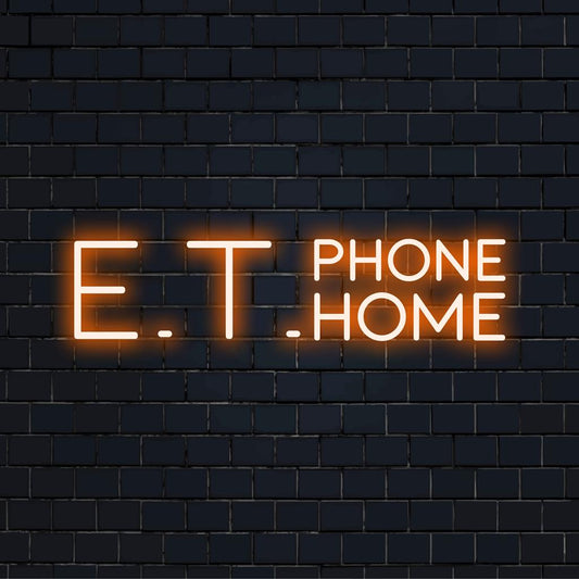 Custom LED neon sign displaying E.T. Phone Home in vibrant light, blending retro charm with modern neon decor.