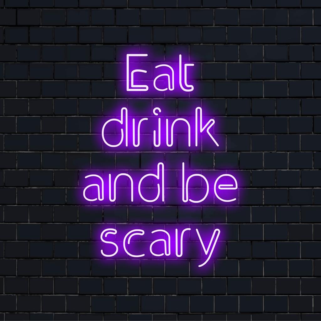 Custom LED neon sign spelling Eat Drink And Be Scary, luminous decor for festive settings or spooky events.