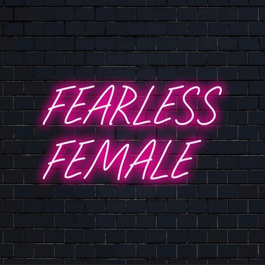 Custom-made LED neon sign of Fearless Female phrase in glowing script for modern wall decor and empowering neon light art.