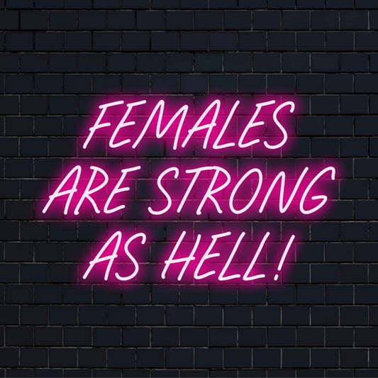 Vibrant LED neon sign beaming 'Females Are Strong As Hell!', perfect for empowering neon wall art and custom decor.