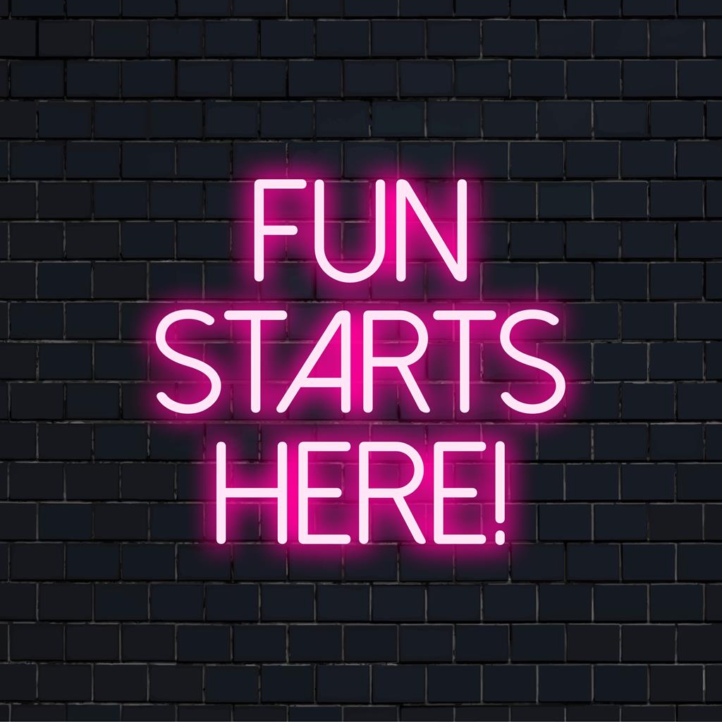 Buntes LED-Neonschild mit lustiger Typografie mit der Aufschrift „Hier beginnt der Spaß!“. Ideal, um jedem Raum eine lebendige Neondekoration hinzuzufügen.