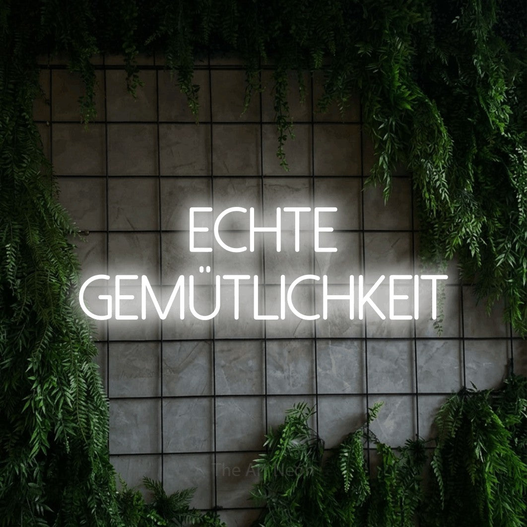 LED neon sign reading “Echte Gemütlichkeit”, arranged in 2 lines.