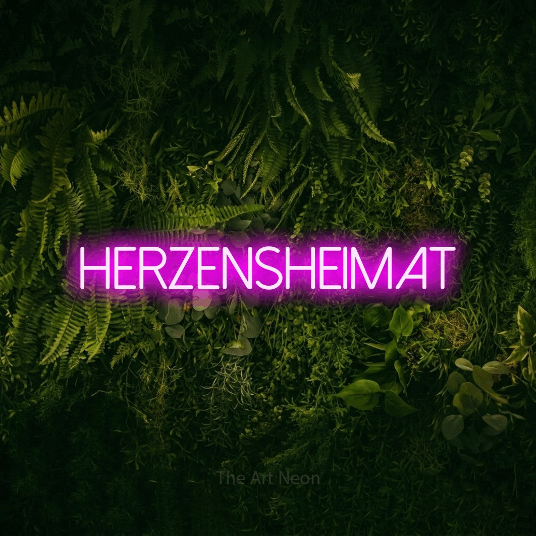 LED neon sign reading “Herzensheimat”, arranged in a single line.