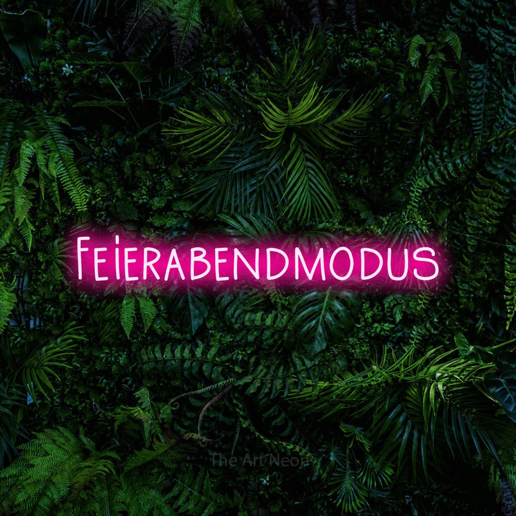 LED neon sign reading “Feierabendmodus”, arranged in a single line.