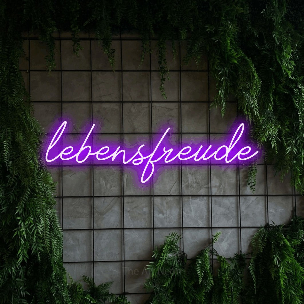 LED neon sign reading “lebensfreude”, arranged in a single line.