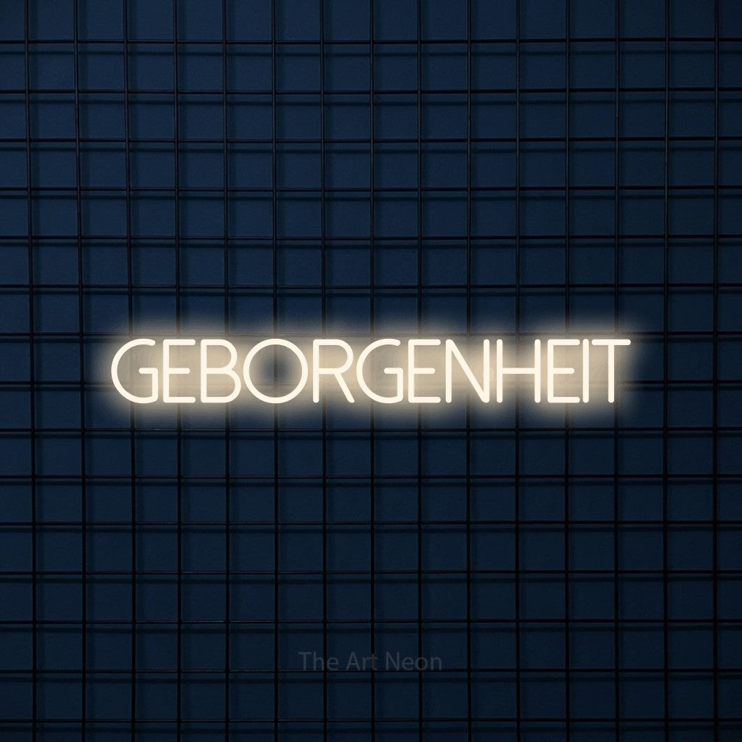 LED neon sign reading “Geborgenheit”, arranged in a single line.