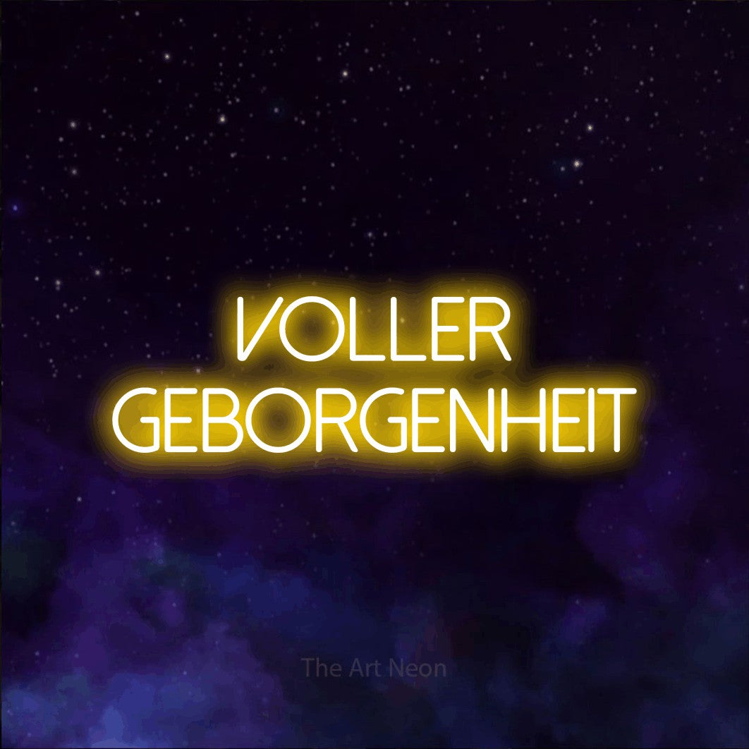 LED neon sign reading “Voller Geborgenheit”, arranged in 2 lines.