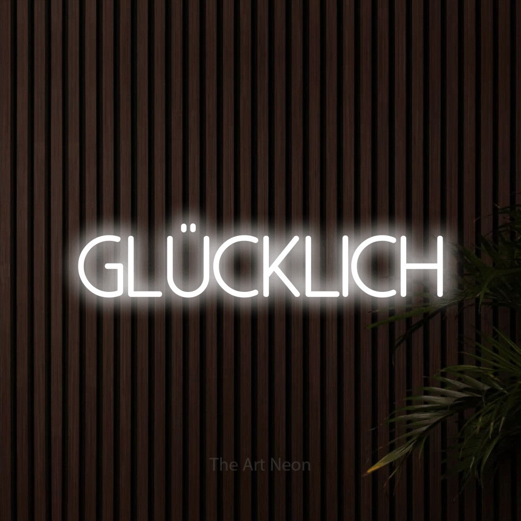 LED neon sign reading “Glücklich”, arranged in a single line.