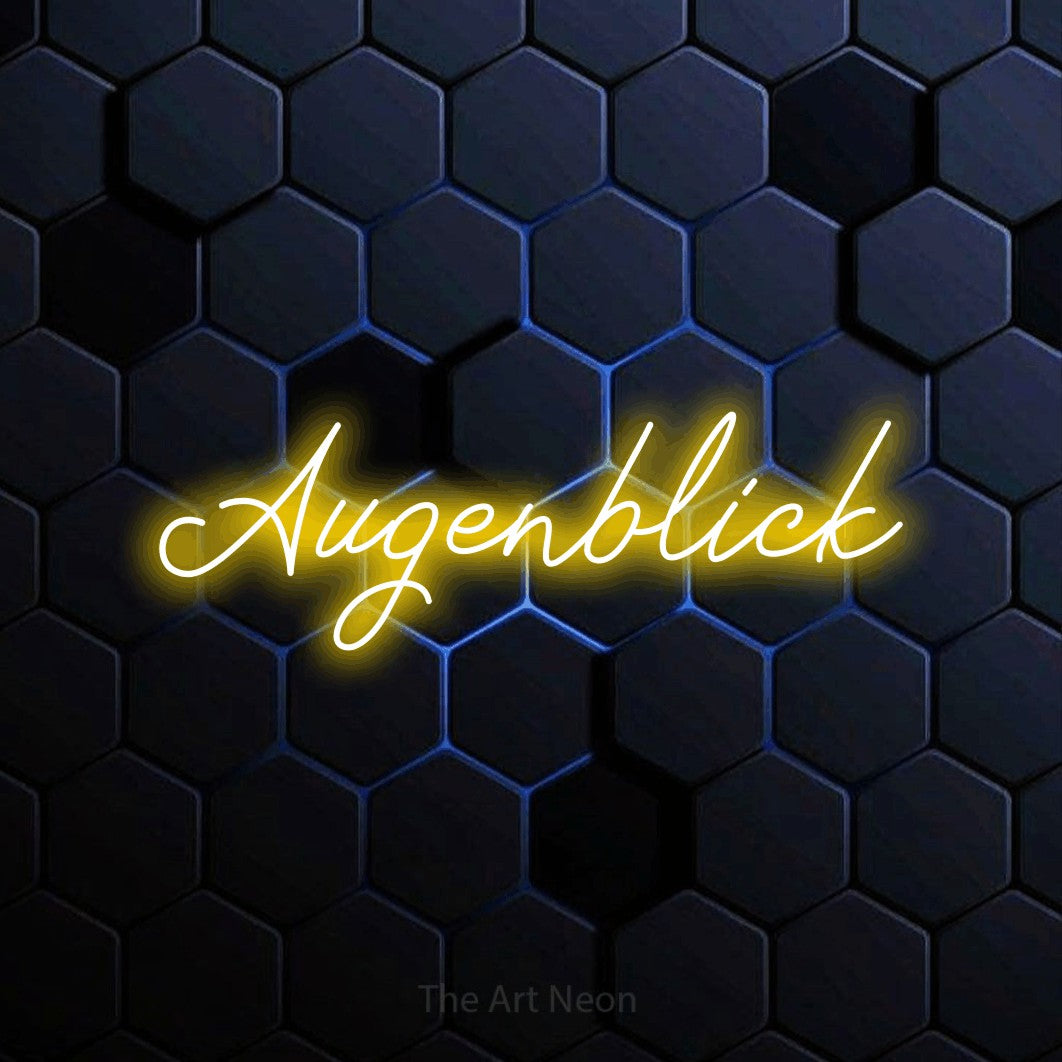 LED neon sign reading “Augenblick”, arranged in a single line.