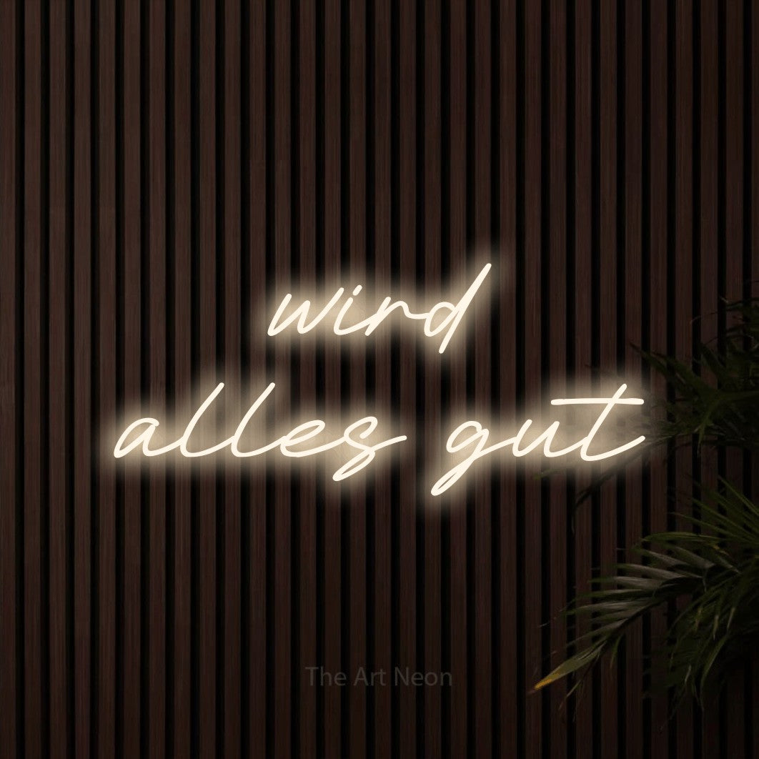 LED neon sign reading “wird alles gut”, arranged in 2 lines.