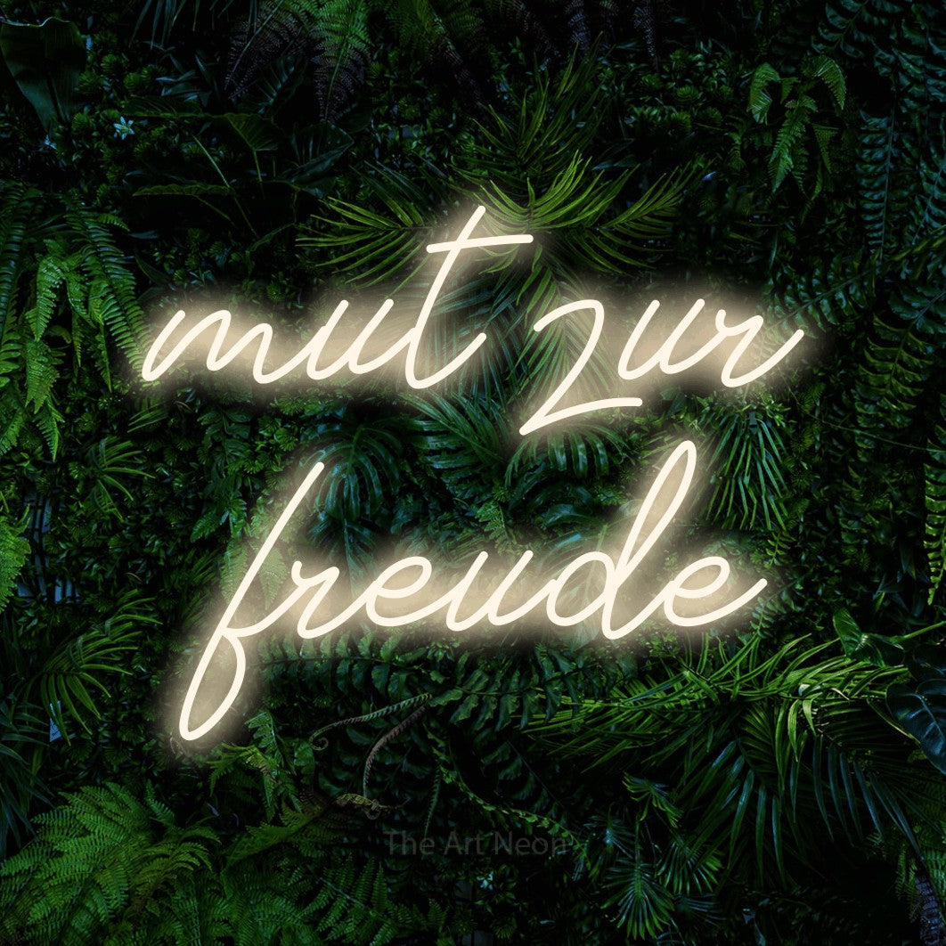 LED neon sign reading “mut zur freude”, arranged in 2 lines.