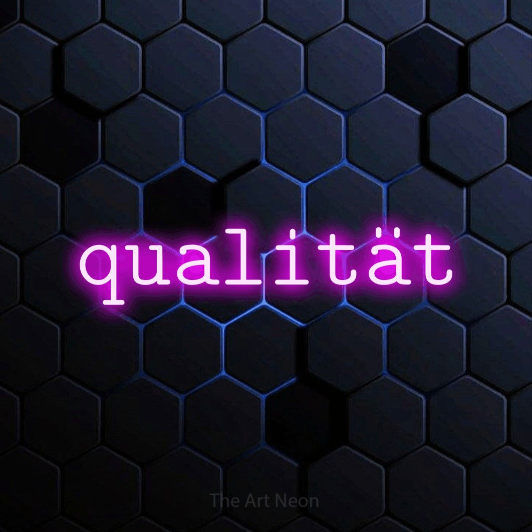 LED neon sign reading “qualität”, arranged in a single line.
