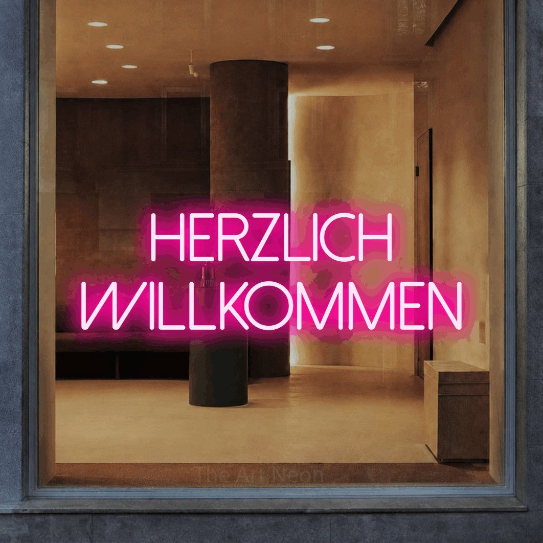 LED neon sign reading “Herzlich willkommen”, arranged in 2 lines.