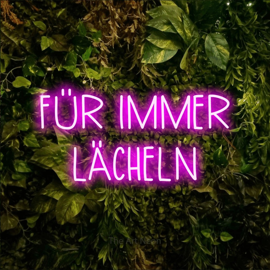 LED neon sign reading “FÜR IMMER LÄCHELN”, arranged in 2 lines.