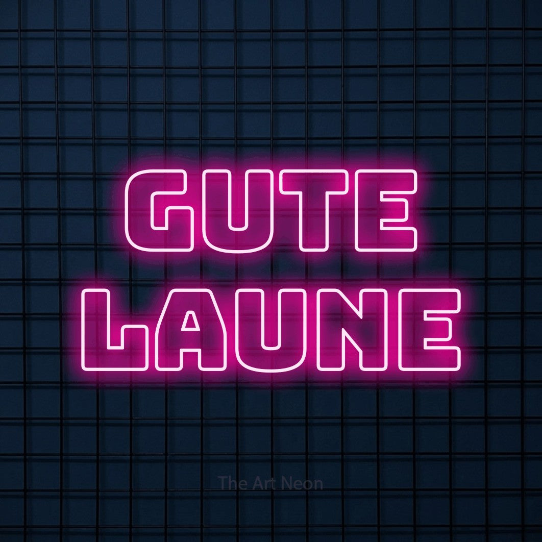 LED neon sign reading “gute laune”, arranged in 2 lines.