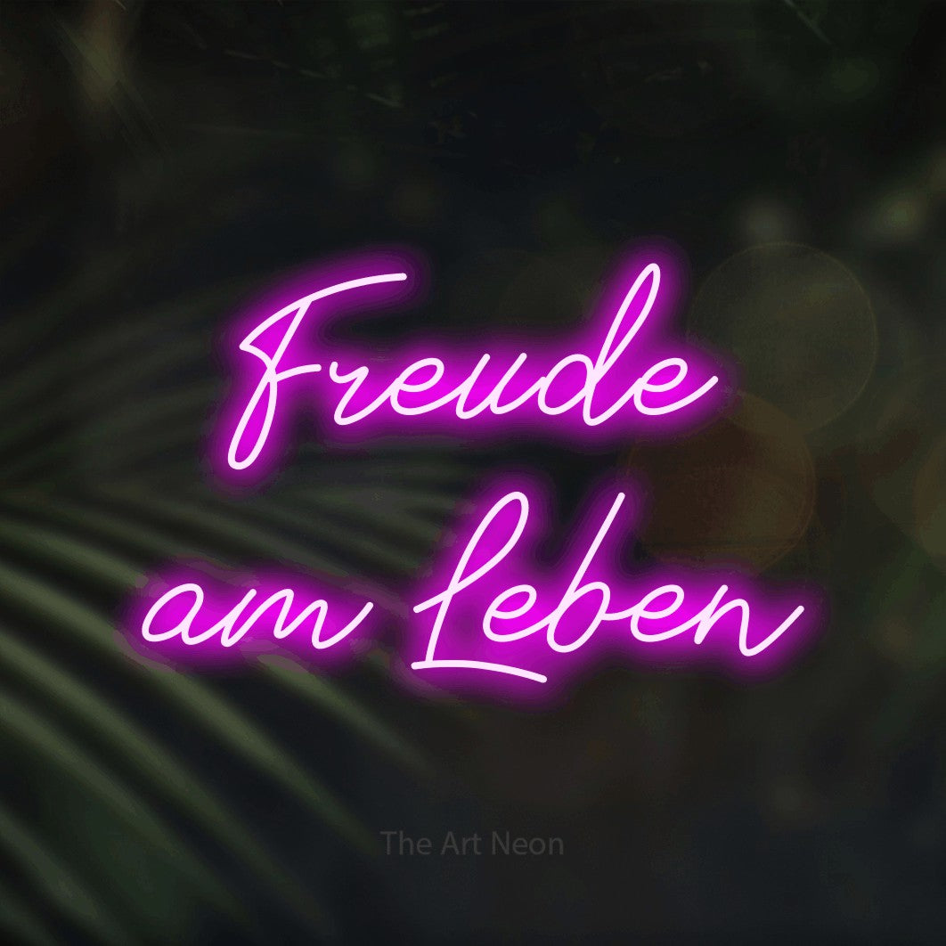 LED neon sign reading “Freude am Leben”, arranged in 2 lines.