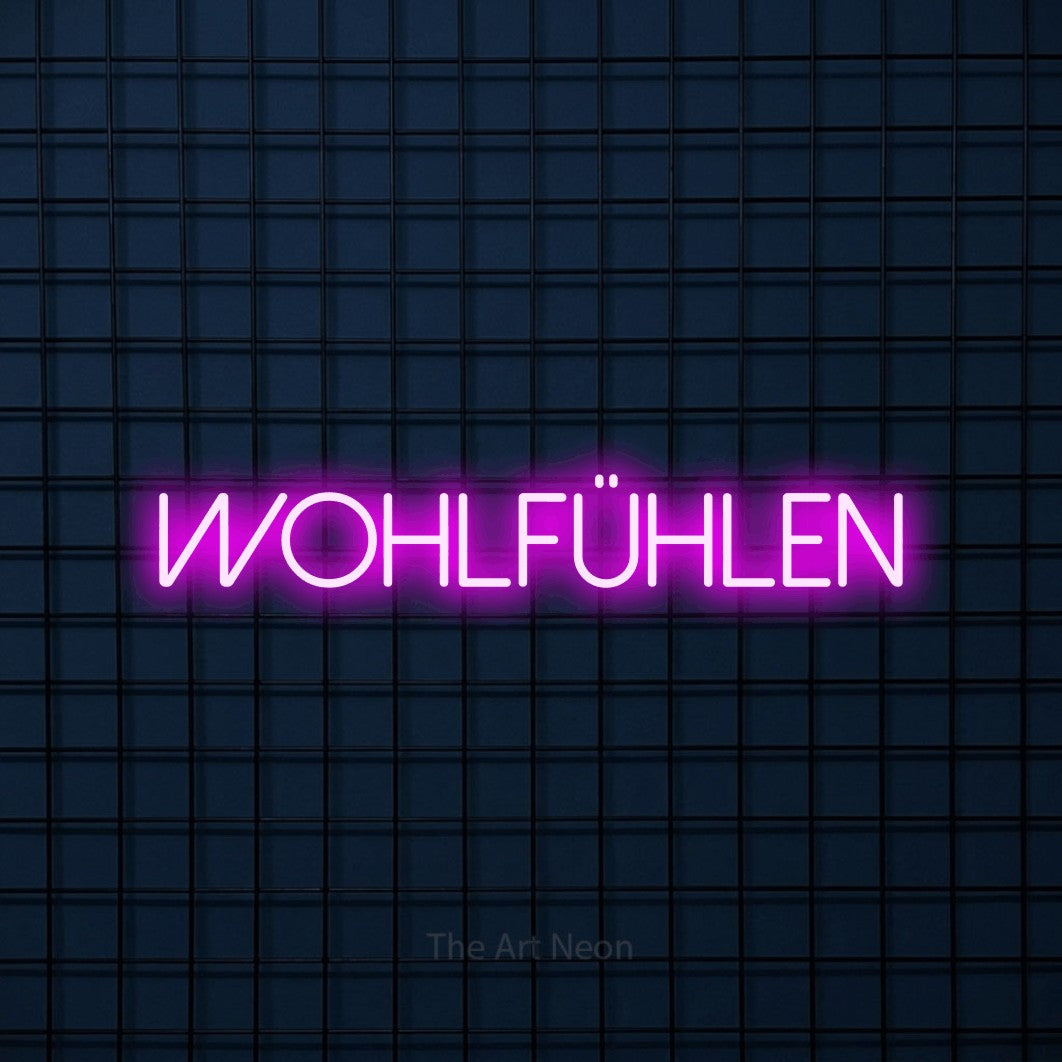LED neon sign reading “wohlfühlen”, arranged in a single line.