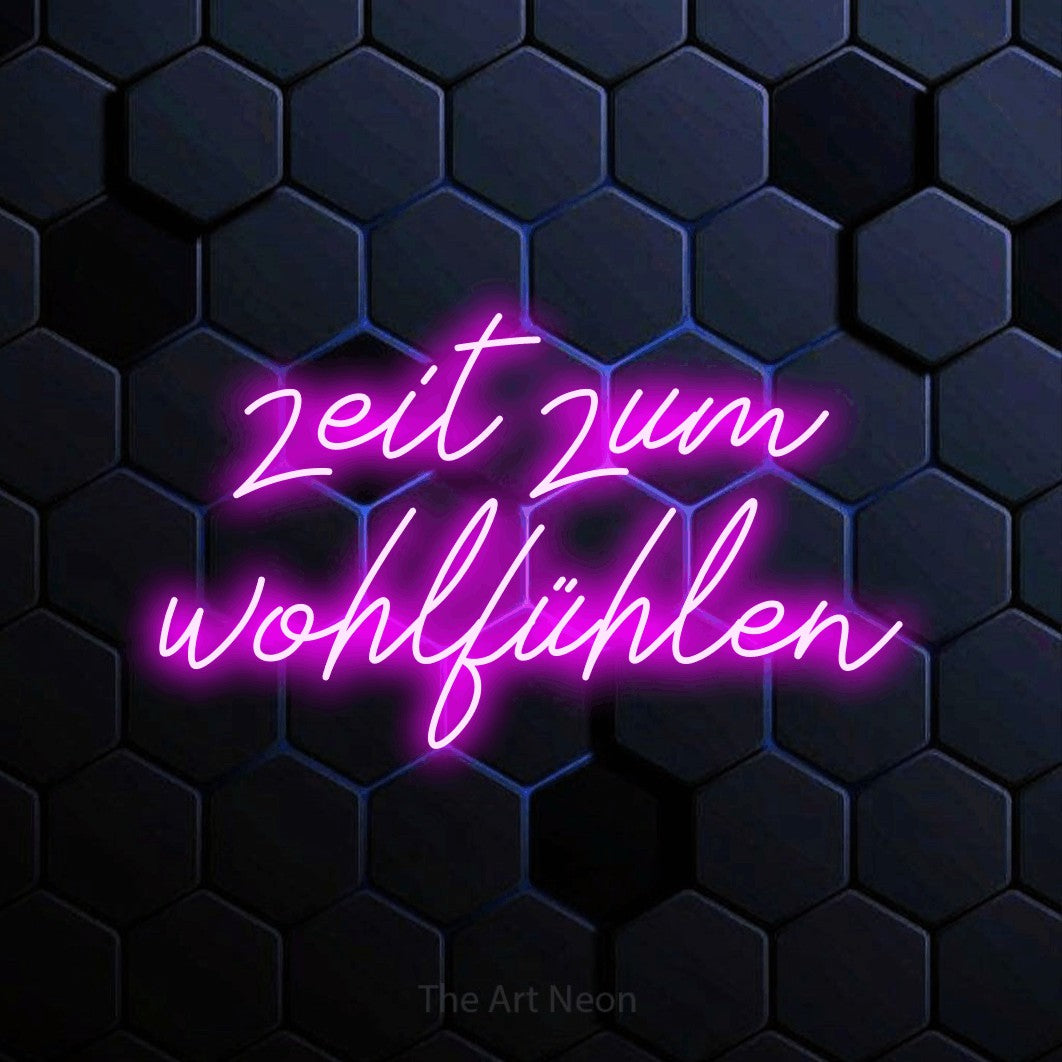 LED neon sign reading “zeit zum wohlfühlen”, arranged in 2 lines.