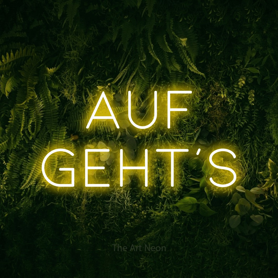 LED neon sign reading “AUF GEHT'S”, arranged in 2 lines.