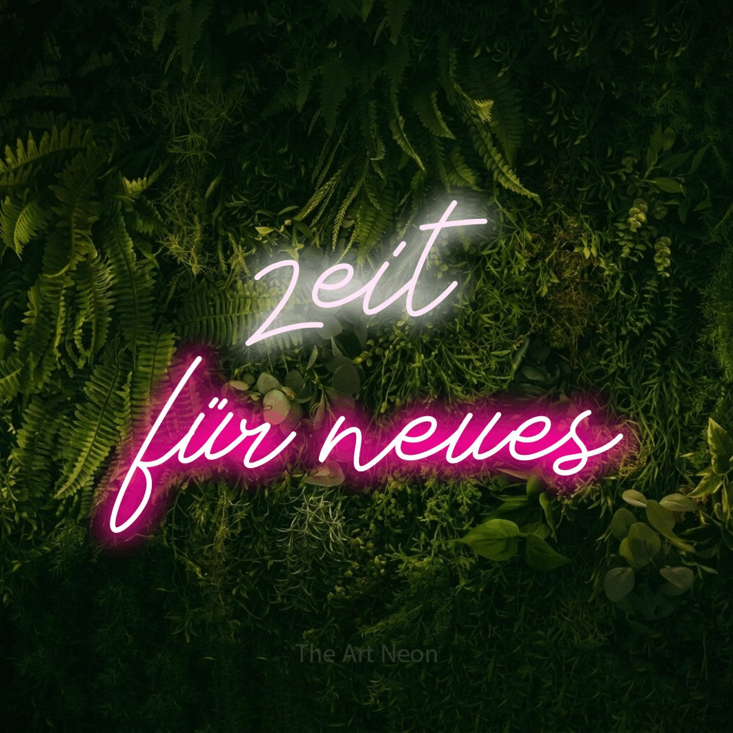 LED neon sign reading “zeit für neues”, arranged in 2 lines.