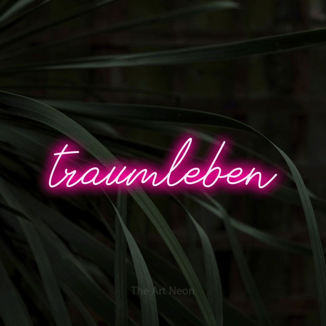 LED neon sign reading “traumleben”, arranged in a single line.
