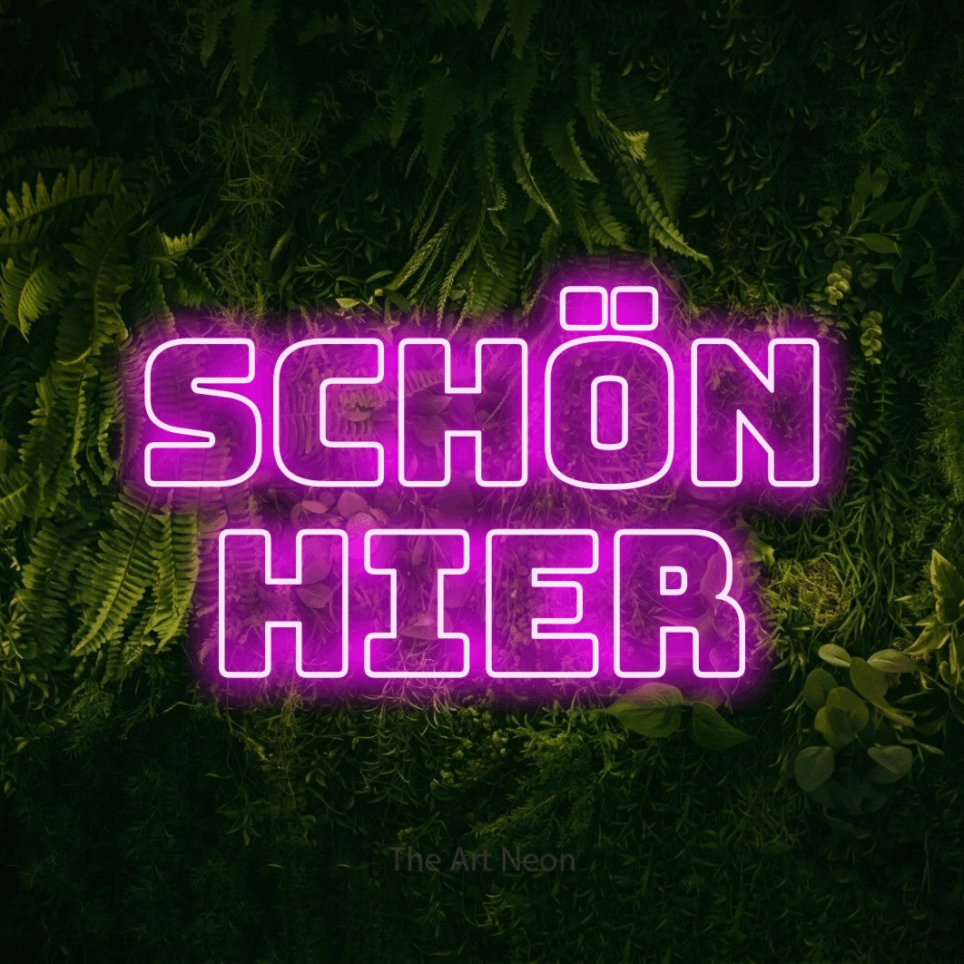 LED neon sign reading “SCHÖN HIER”, arranged in 2 lines.