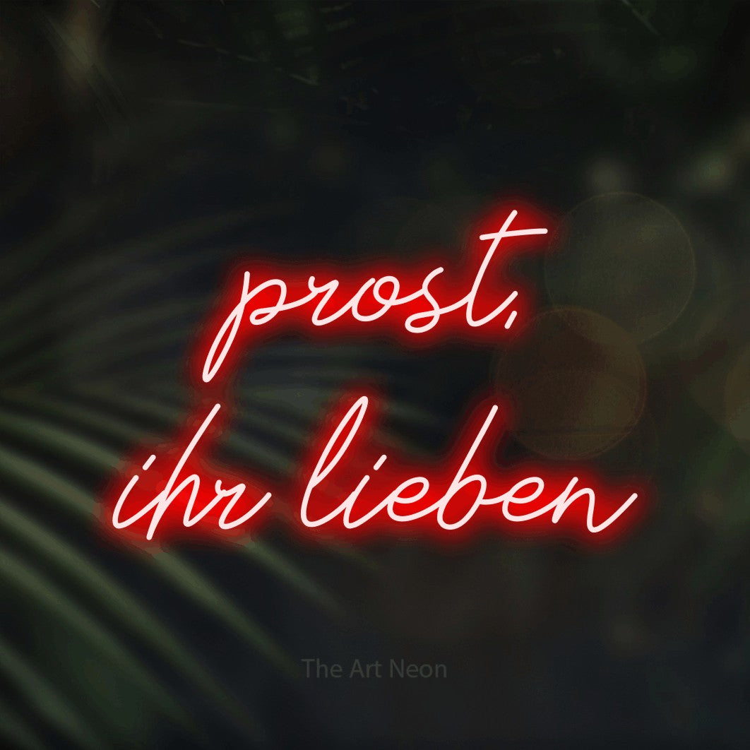 LED neon sign reading “prost, ihr lieben”, arranged in 2 lines.