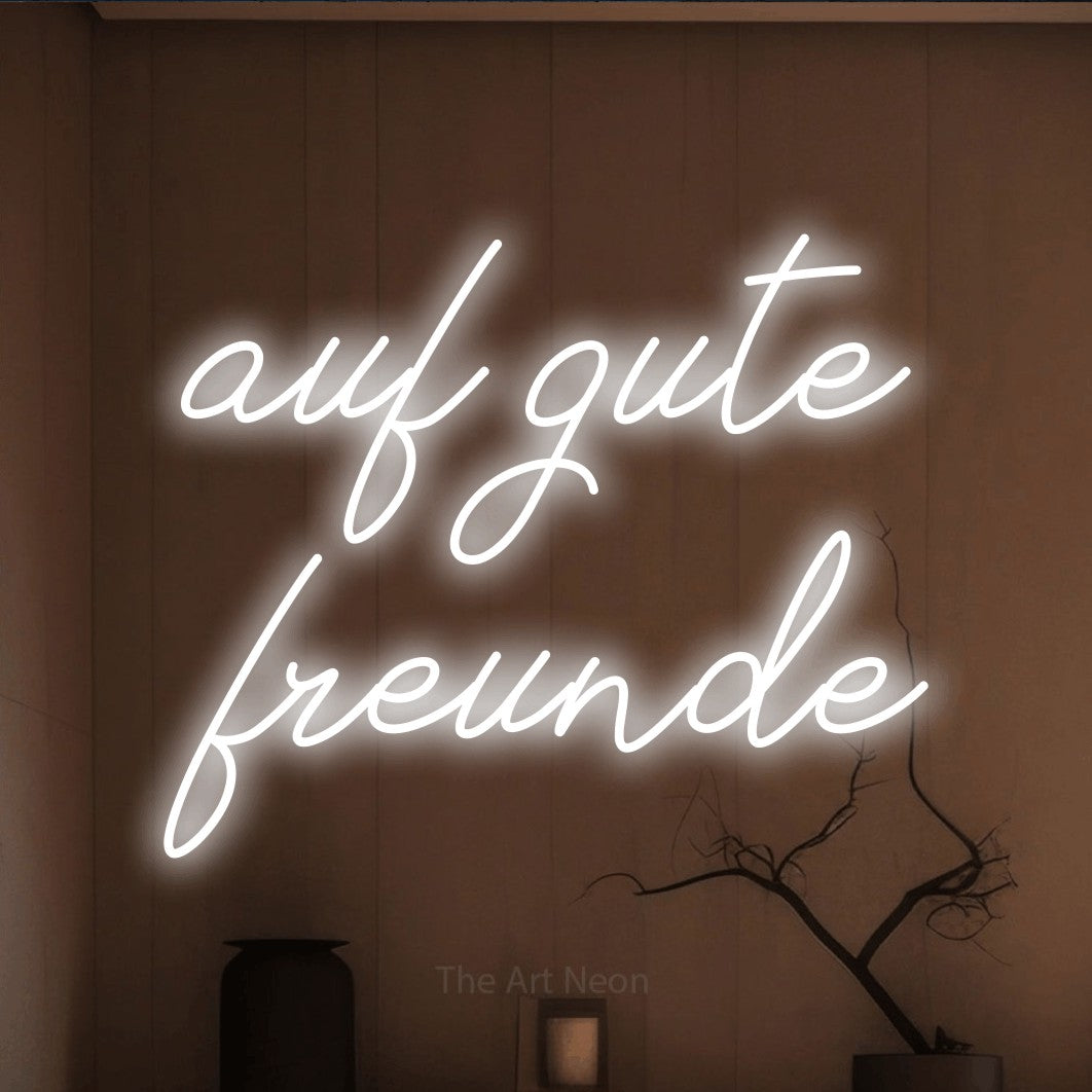 LED neon sign reading “auf gute freunde”, arranged in 2 lines.
