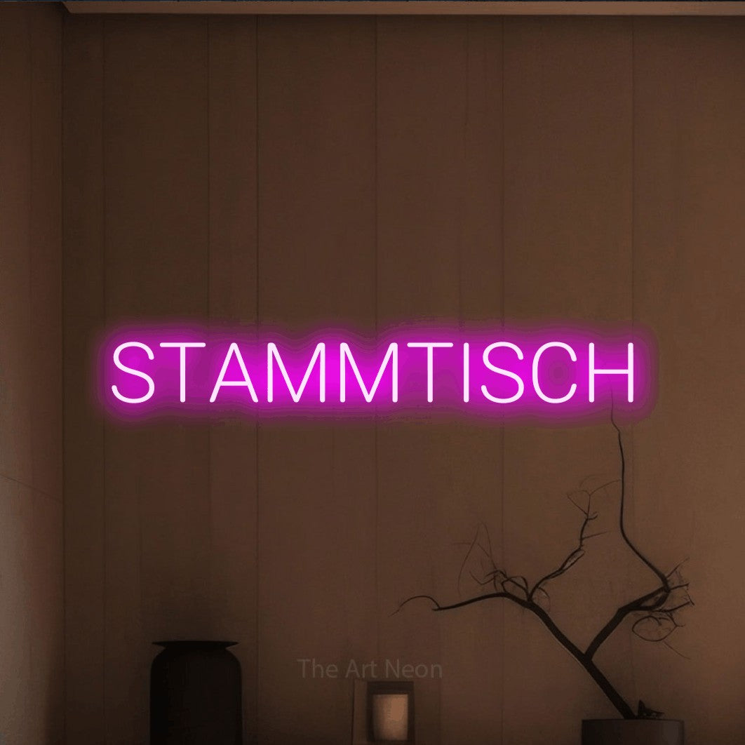 LED neon sign reading “STAMMTISCH”, arranged in a single line.