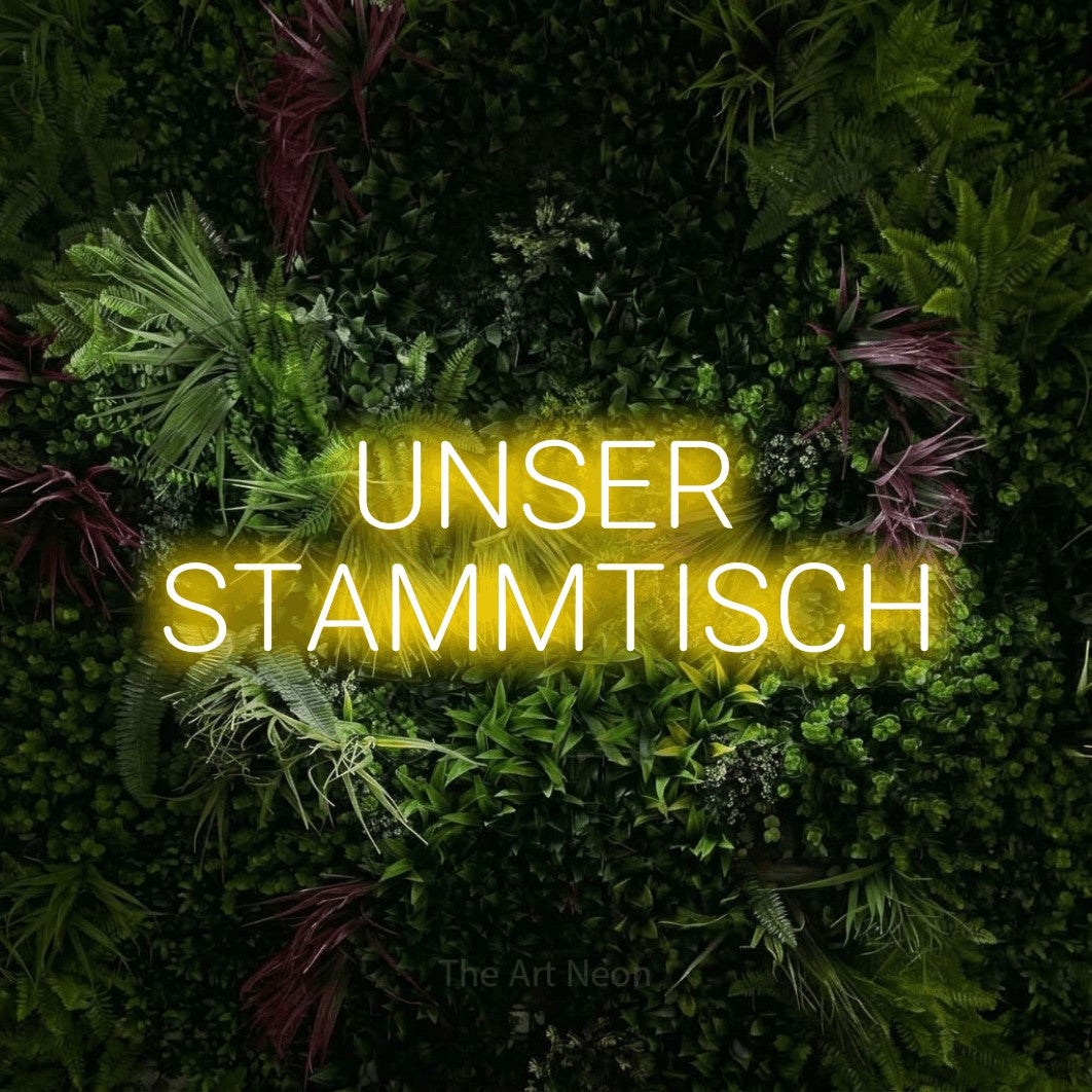 LED neon sign reading “UNSER STAMMTISCH”, arranged in 2 lines.
