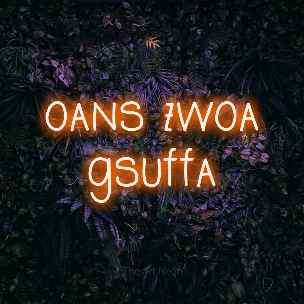LED neon sign reading “oans zwoa gsuffa”, arranged in 2 lines.