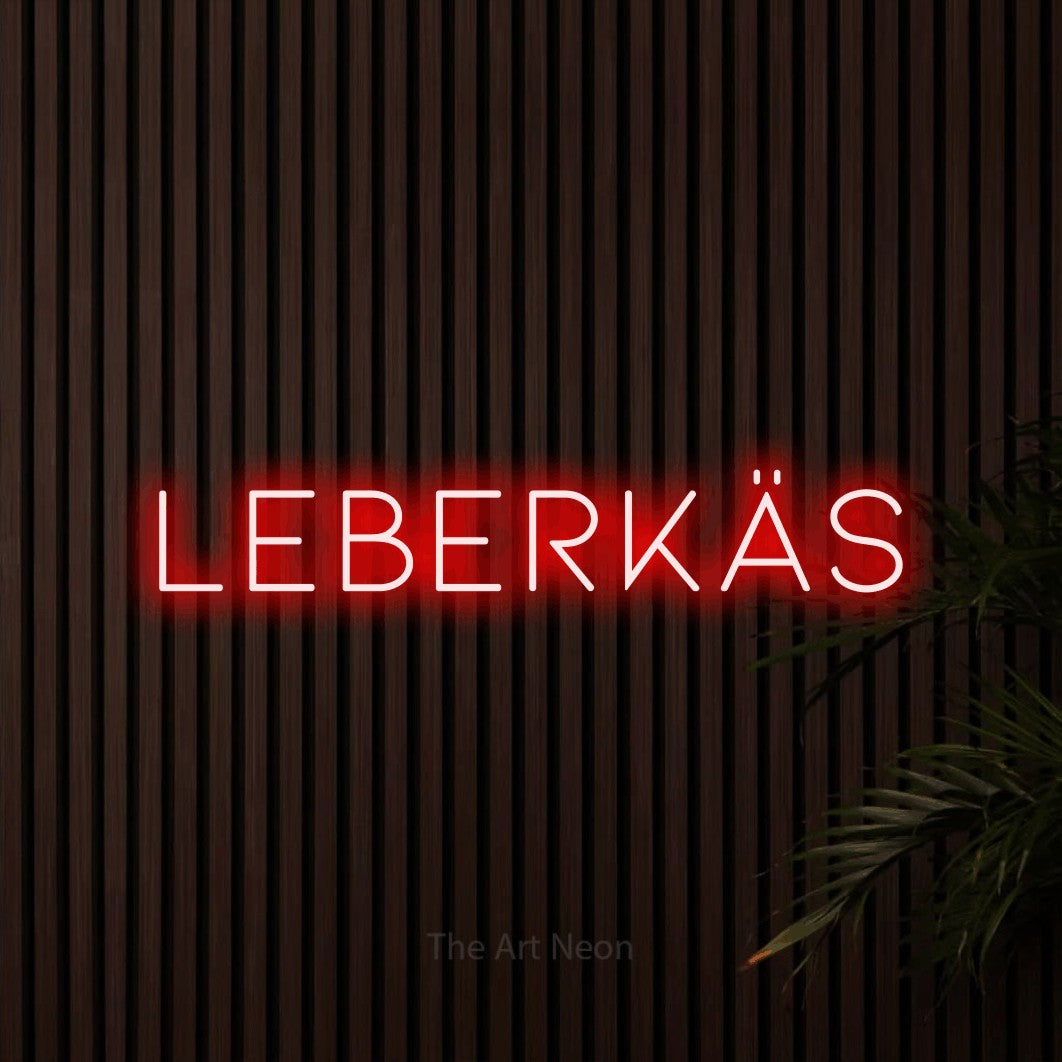 LED neon sign reading “LEBERKÄS”, arranged in a single line.