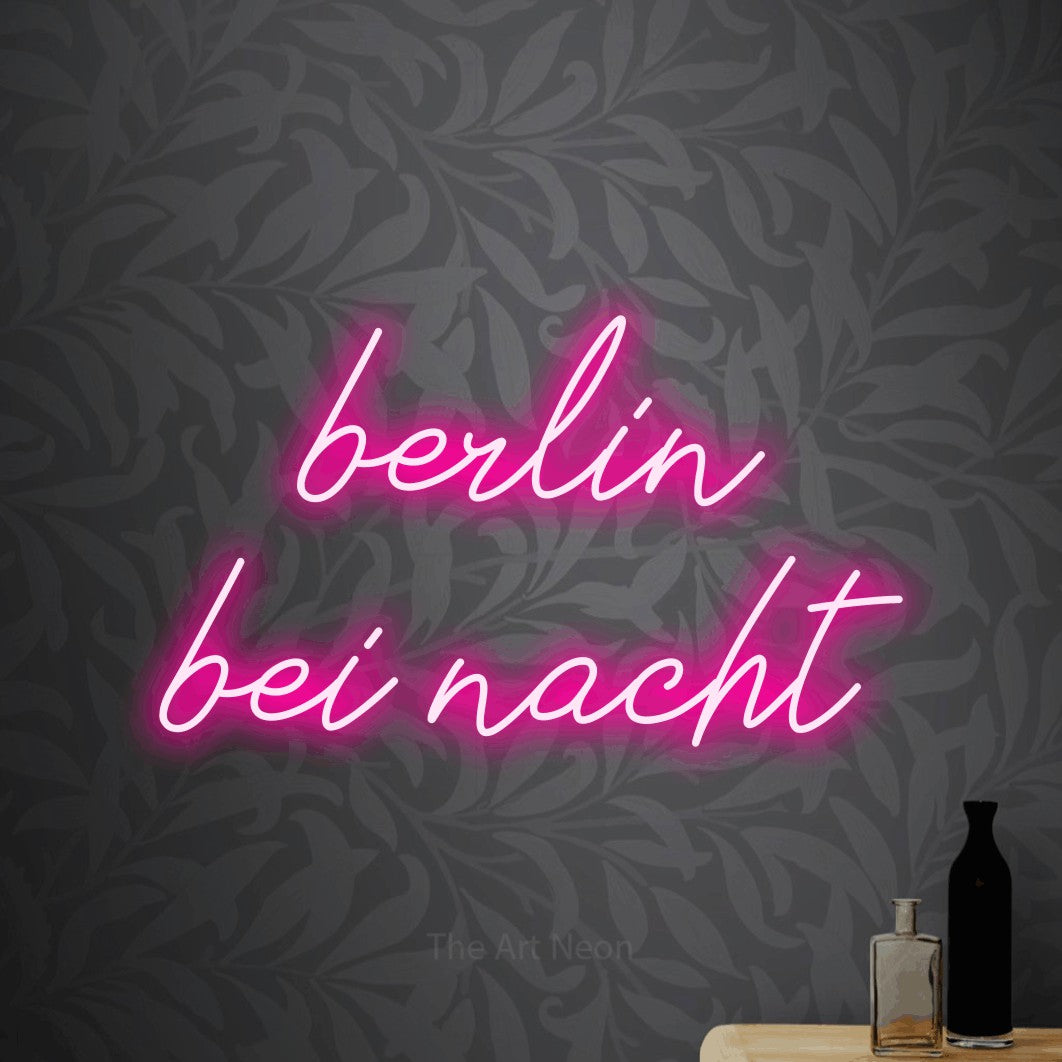 LED neon sign reading “berlin bei nacht”, arranged in 2 lines.