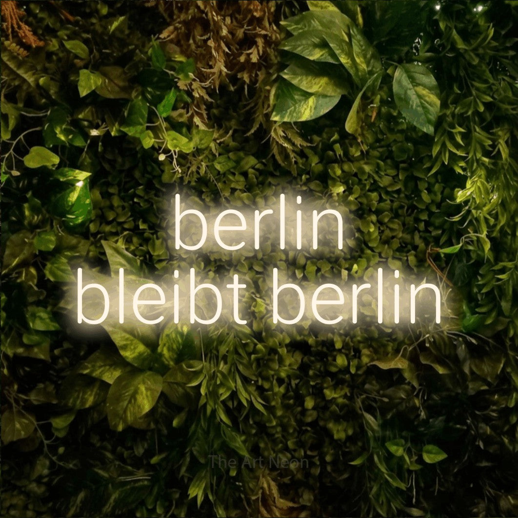 LED neon sign reading “berlin bleibt berlin”, arranged in 2 lines.
