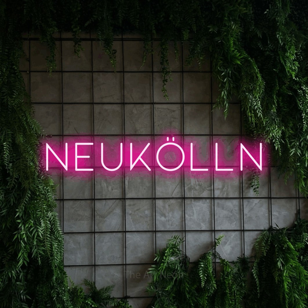 LED neon sign reading “Neukölln”, arranged in a single line.