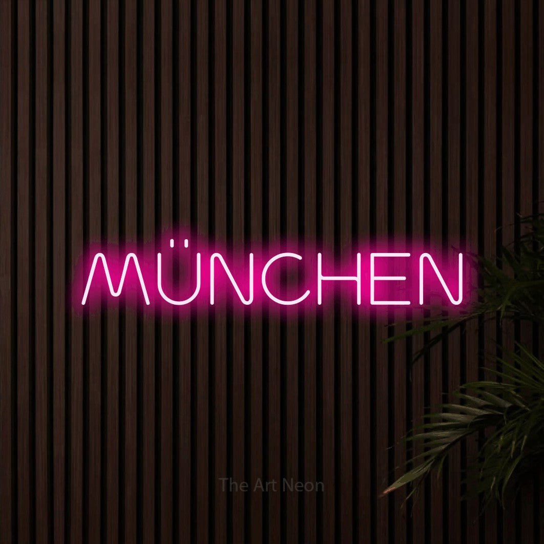 LED neon sign reading “MÜNCHEN”, arranged in a single line.
