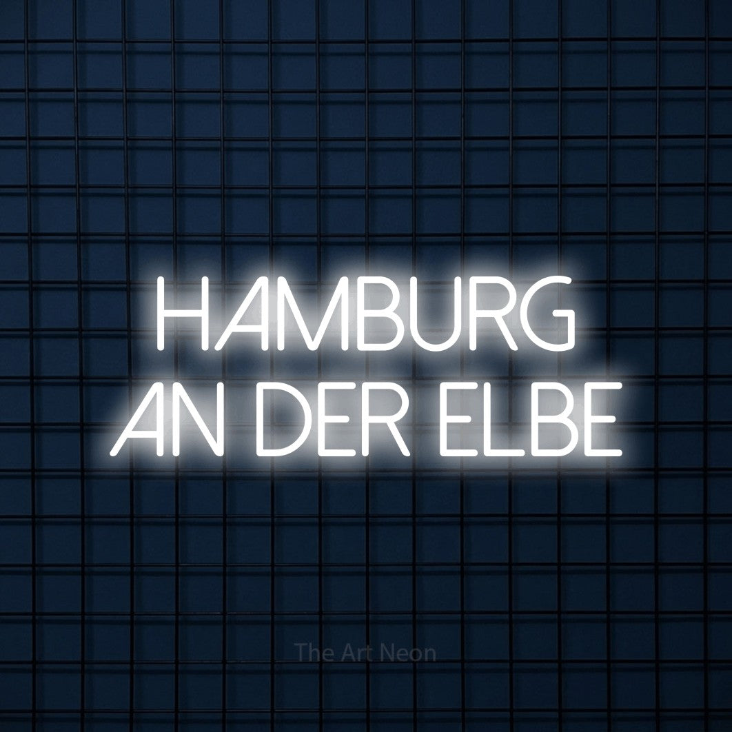 LED neon sign reading “Hamburg an der Elbe”, arranged in 2 lines.