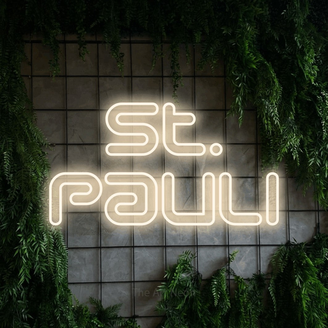 LED neon sign reading “St. Pauli”, arranged in 2 lines.